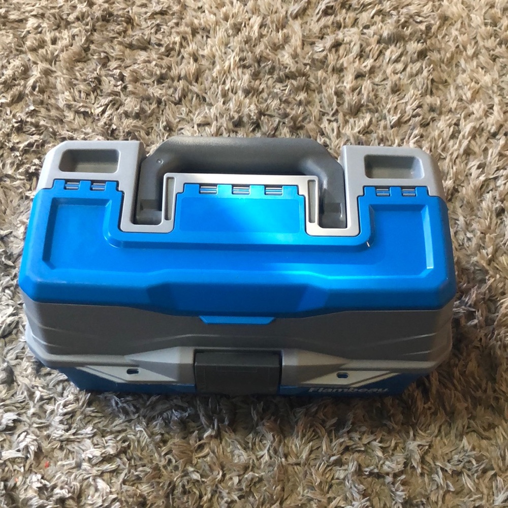 I am selling a tackle box, the brand is Flambeau, the color is blue and gray